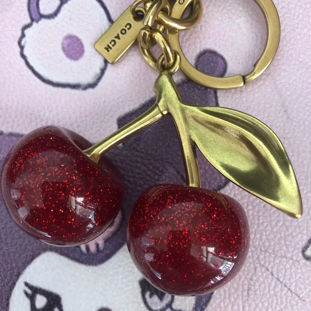 Coach keychain gold